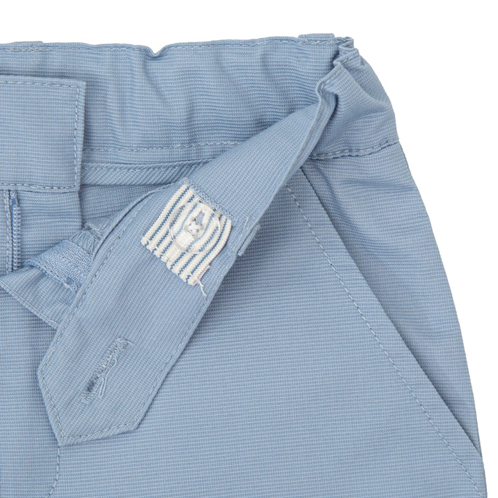 Ceramic-colored Aikido woven Bermuda shorts, offering a stylish and comfortable option for kids' summer adventures.