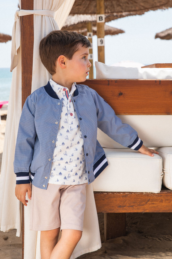 Navy blue Regata knitted polo neck for kids, combining classic style with comfort for a versatile summer wardrobe staple.