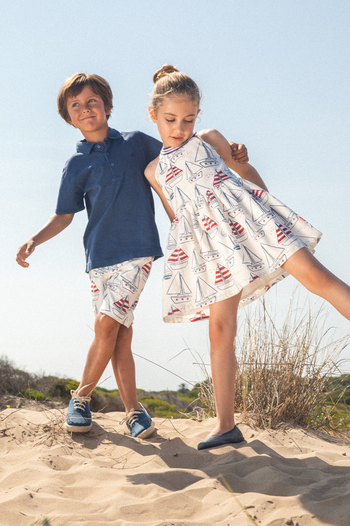 Navy blue woven Bermuda shorts from Tutto Piccolo, designed for boys, combining style and comfort, perfect for summer adventures or casual outings.