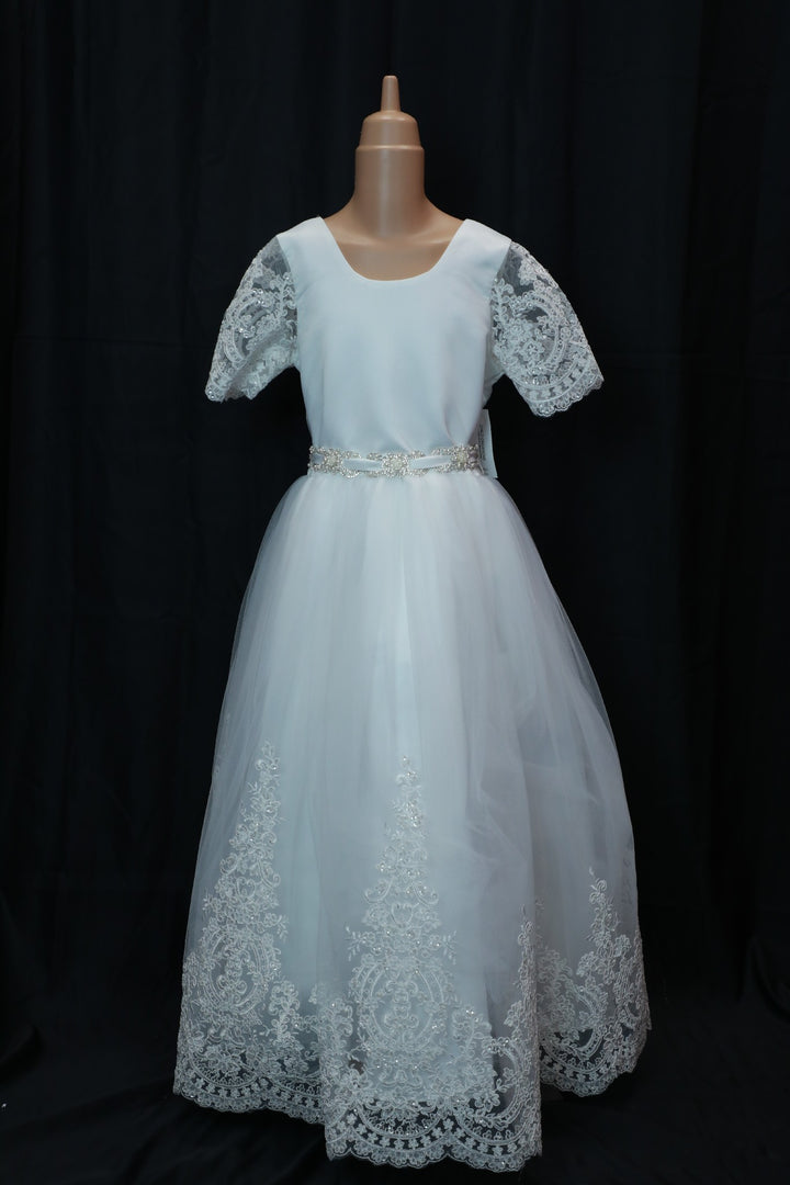 White lace dress with sleeves, ideal for baby girls.